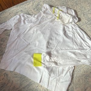 White hoodie with green detailing